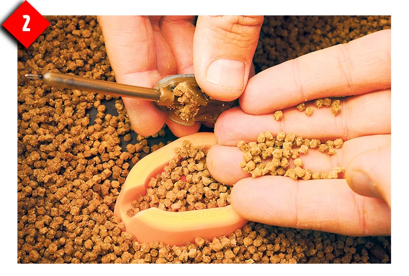 Place more pellets on top of the hookbait so it is well covered