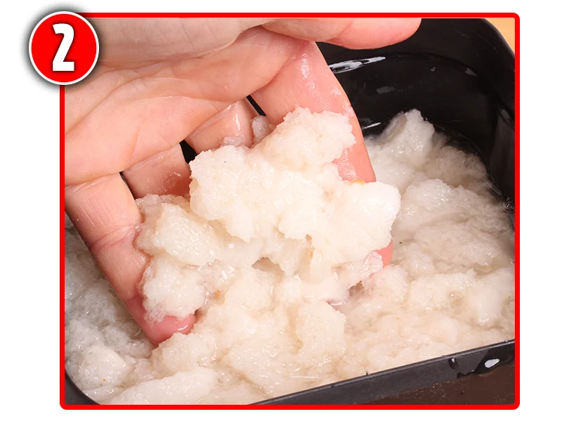 Tear the bread into small chunks and soak in river water.