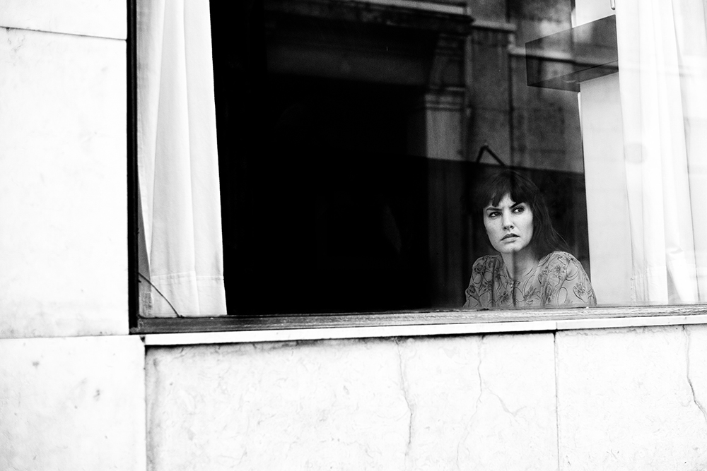 Craig-Reilly-Photography-Lisbon-bnw-portrait-through-window.jpeg