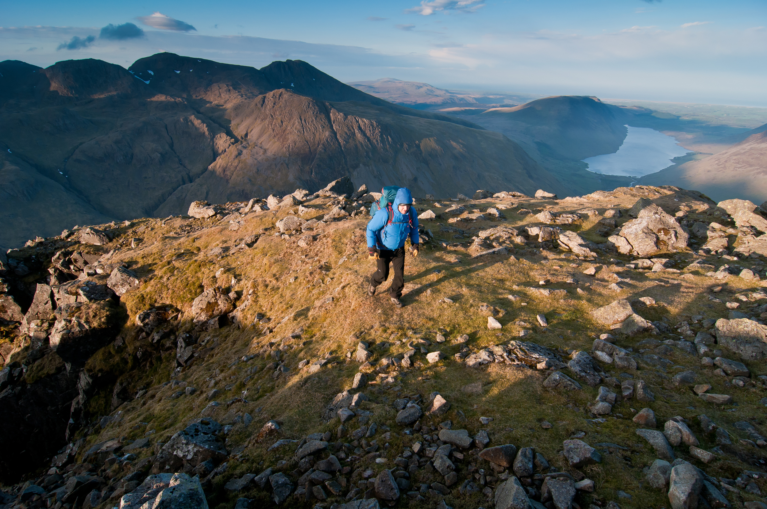 Nearing the 899m summit of Great Gable, Wasdale and the Scafells beyond. Photograph: Matthew Roberts / Trail Magazine