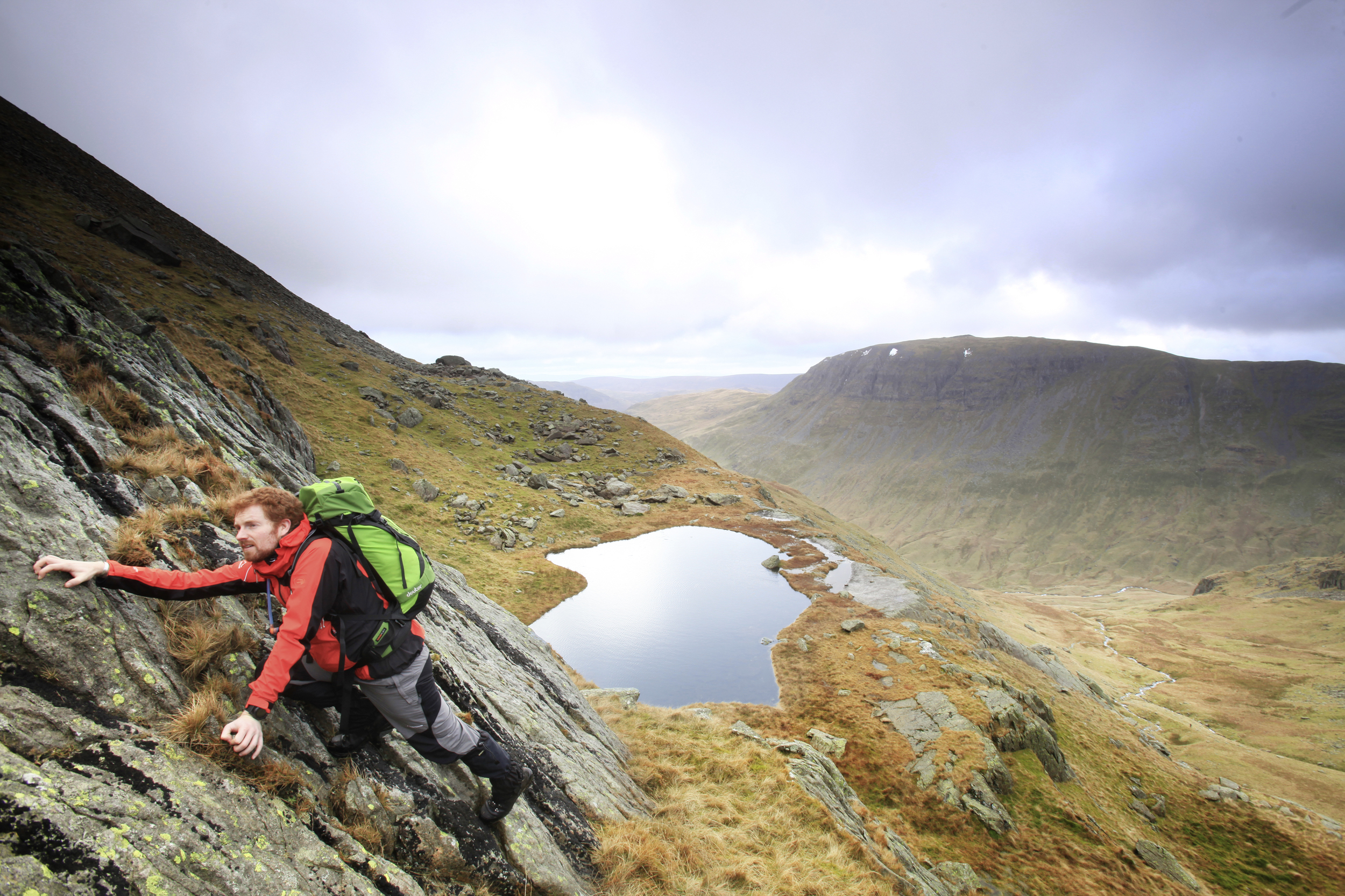 Scrambling hard above Hard Tarn. Photo : Tom Bailey © Trail Magazine