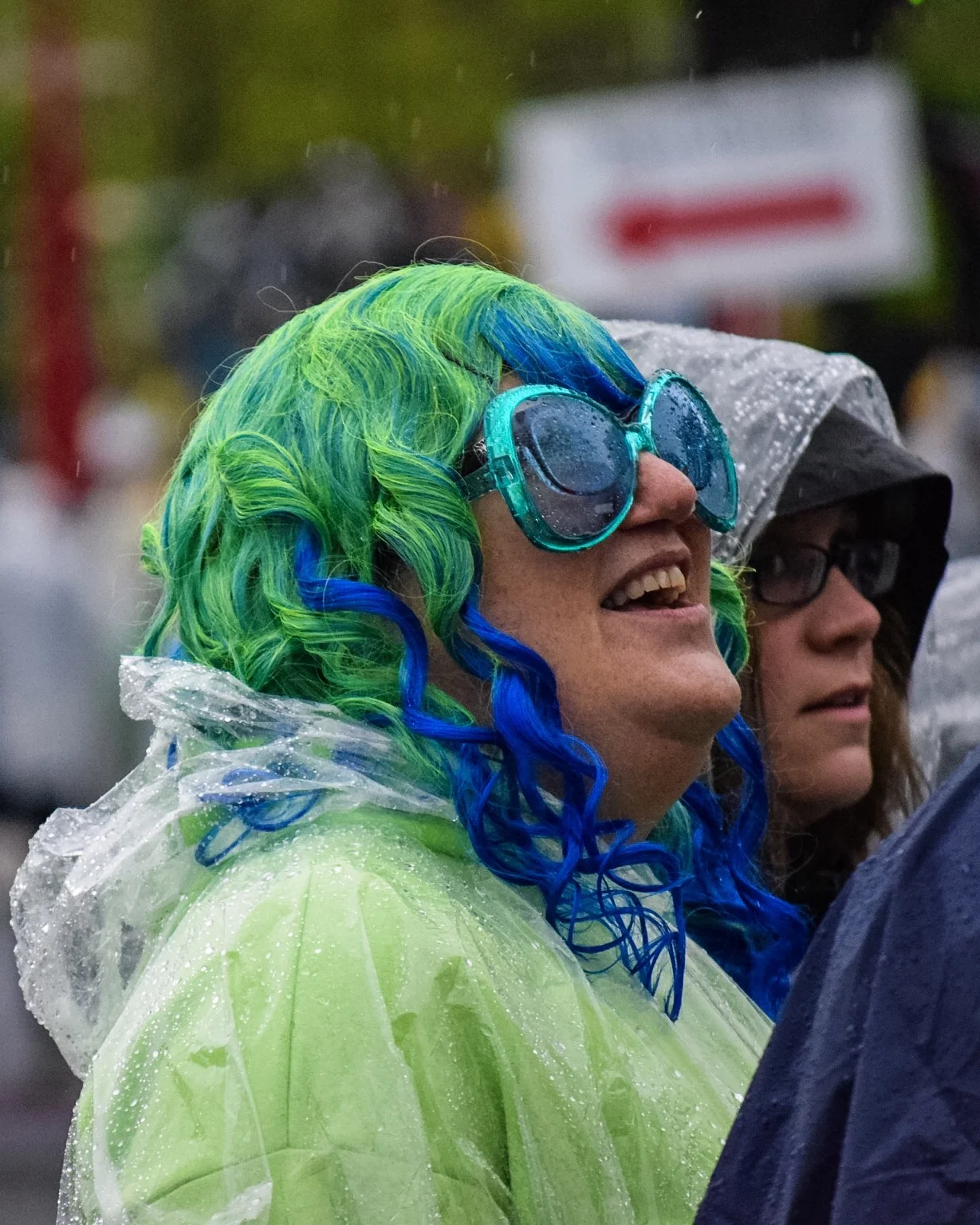 Cheerleaders shining through the rain