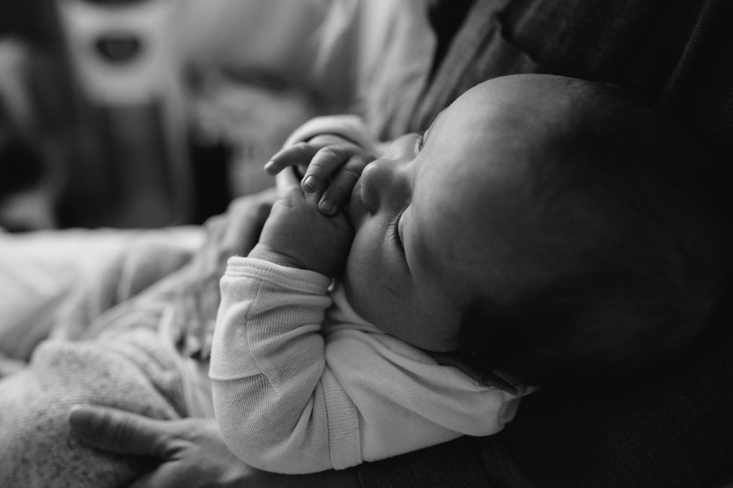 2 month old baby boy in mom's arms {Toronto Family Photographer}
