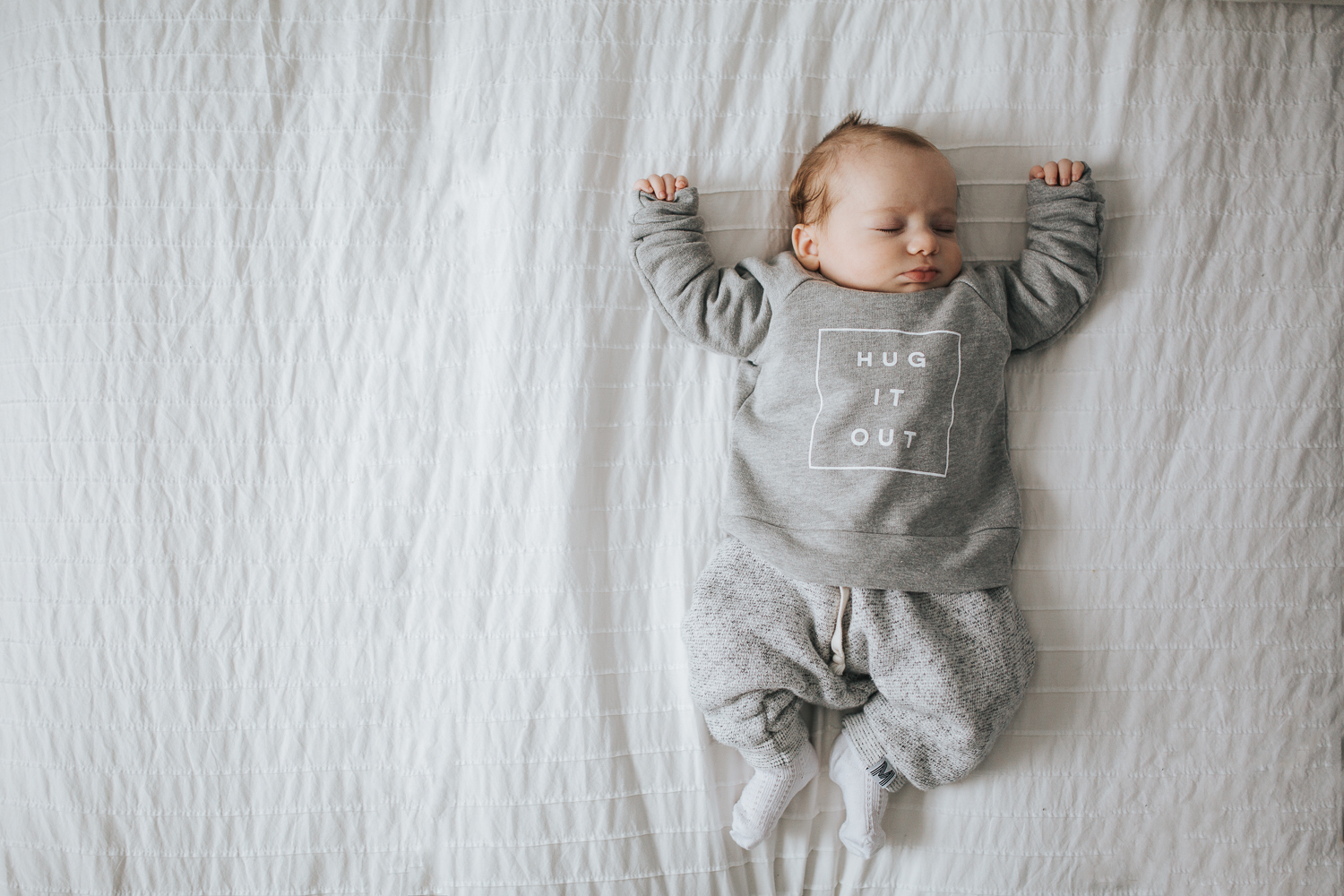 2 month old baby boy lying on bed {Toronto Family Photographer}