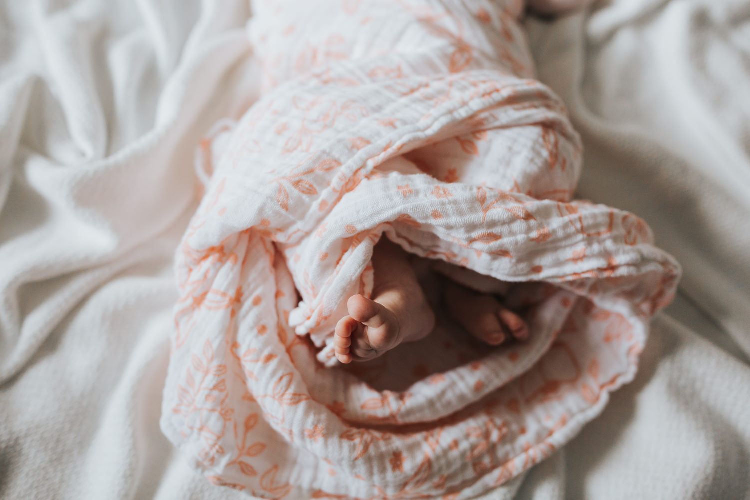 newborn baby girl feet on bed - Stouffville newborn photography