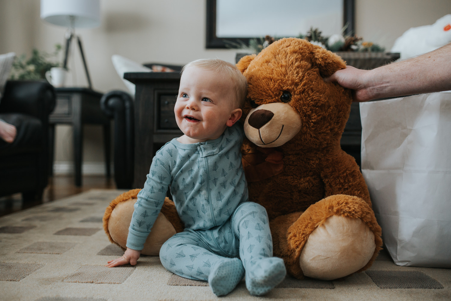 1 year old baby boy with giant stuffed bear on christmas morning - stouffville child photography