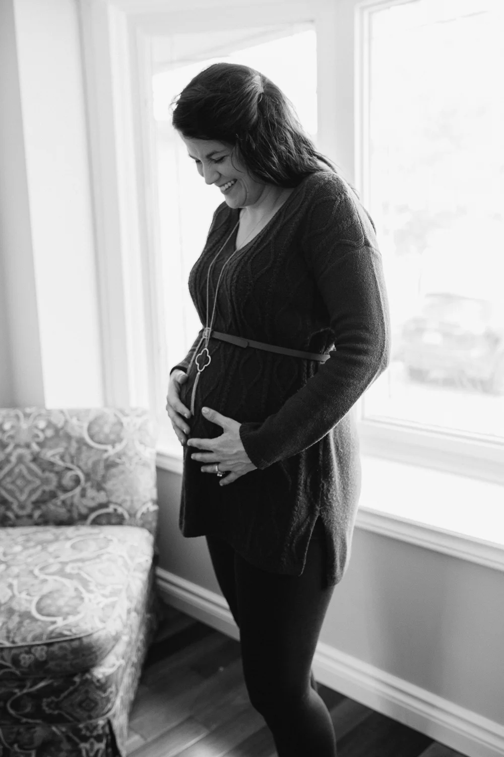 pregnant mother to be holding baby bump - Markham Lifestyle Photography