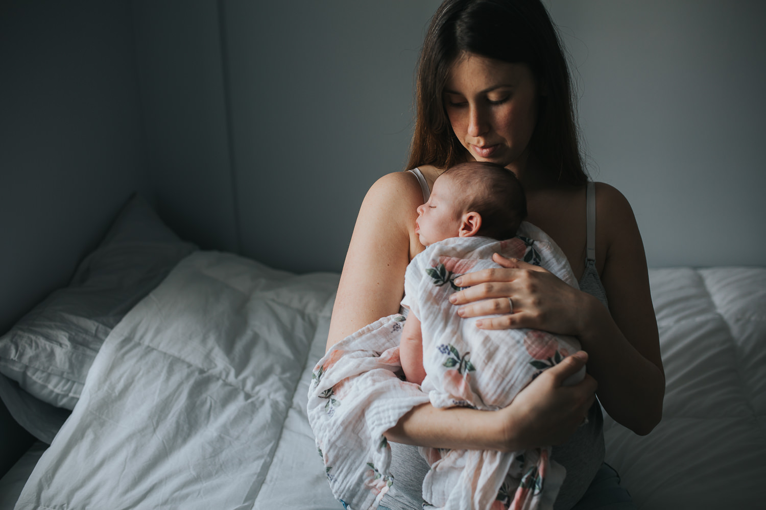new mom holding 6 week old baby girl to chest - Newmarket lifestyle photography