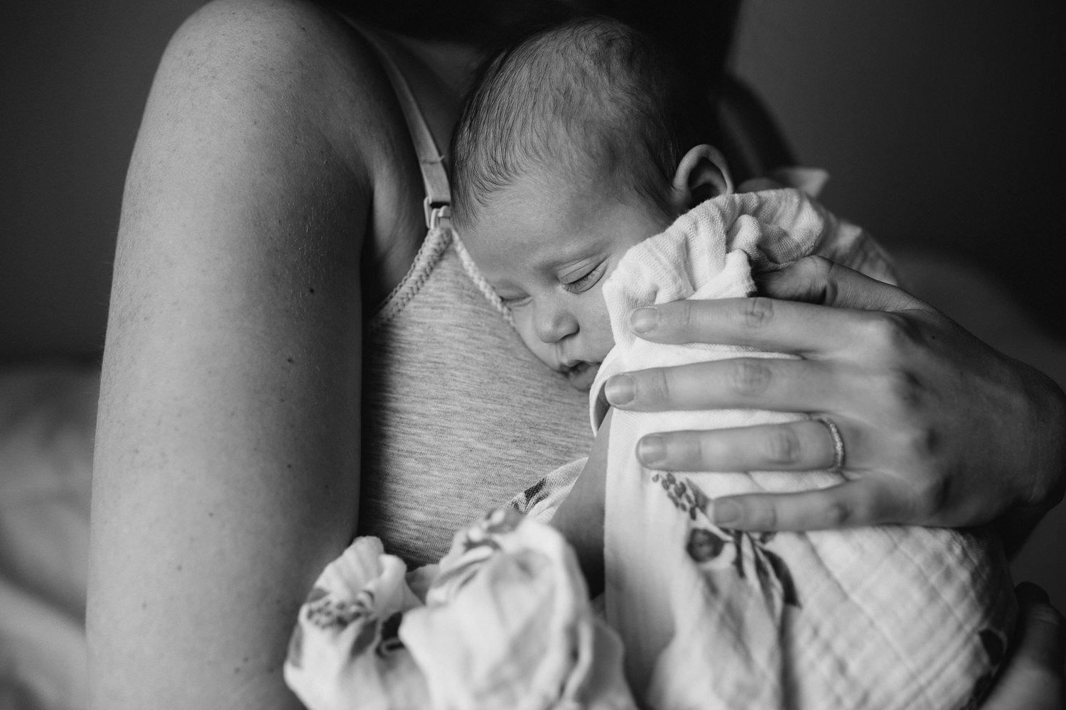 new mom holding 6 week old baby girl to chest - Stouffville lifestyle photography