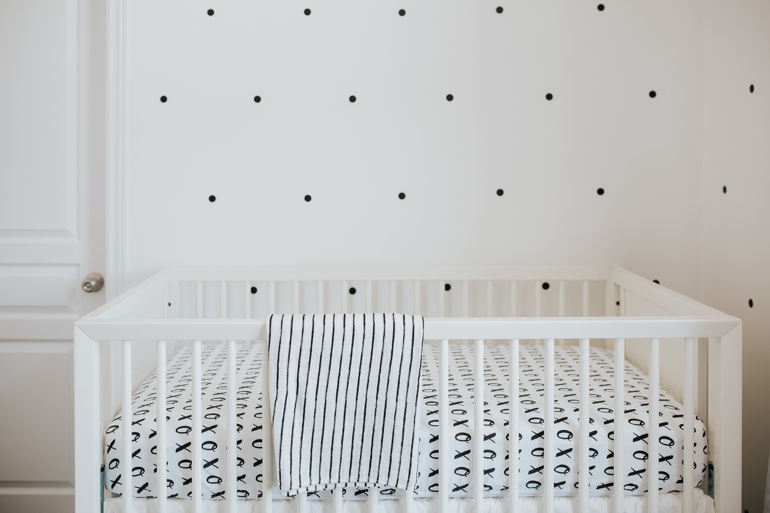 black and white nursery details, white crib and polka dot decals - Stouffville lifestyle photos