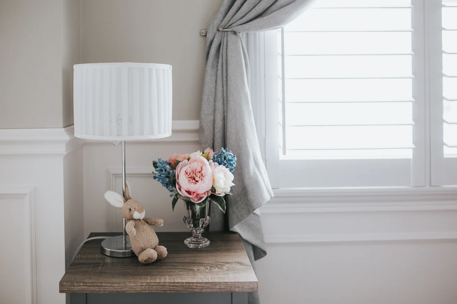nursery details, side table with pastel peonies and plush bunny - Newmarket Lifestyle Photography