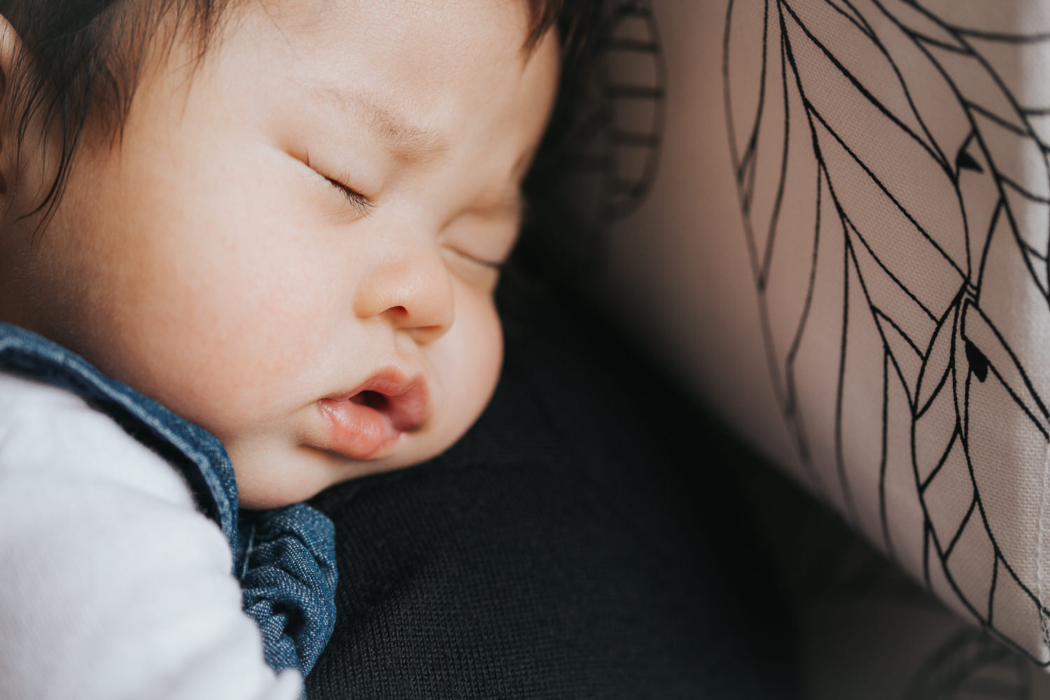 3 month old baby girl fast asleep on mother's shoulder - Barrie In-Home Photography