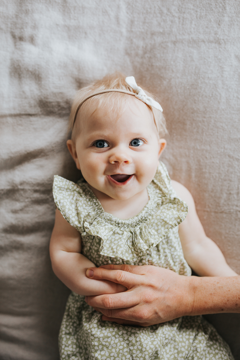 Lexica - 6 month old baby boy, with white skin, blue eyes, golden hair,  happy bigger smile