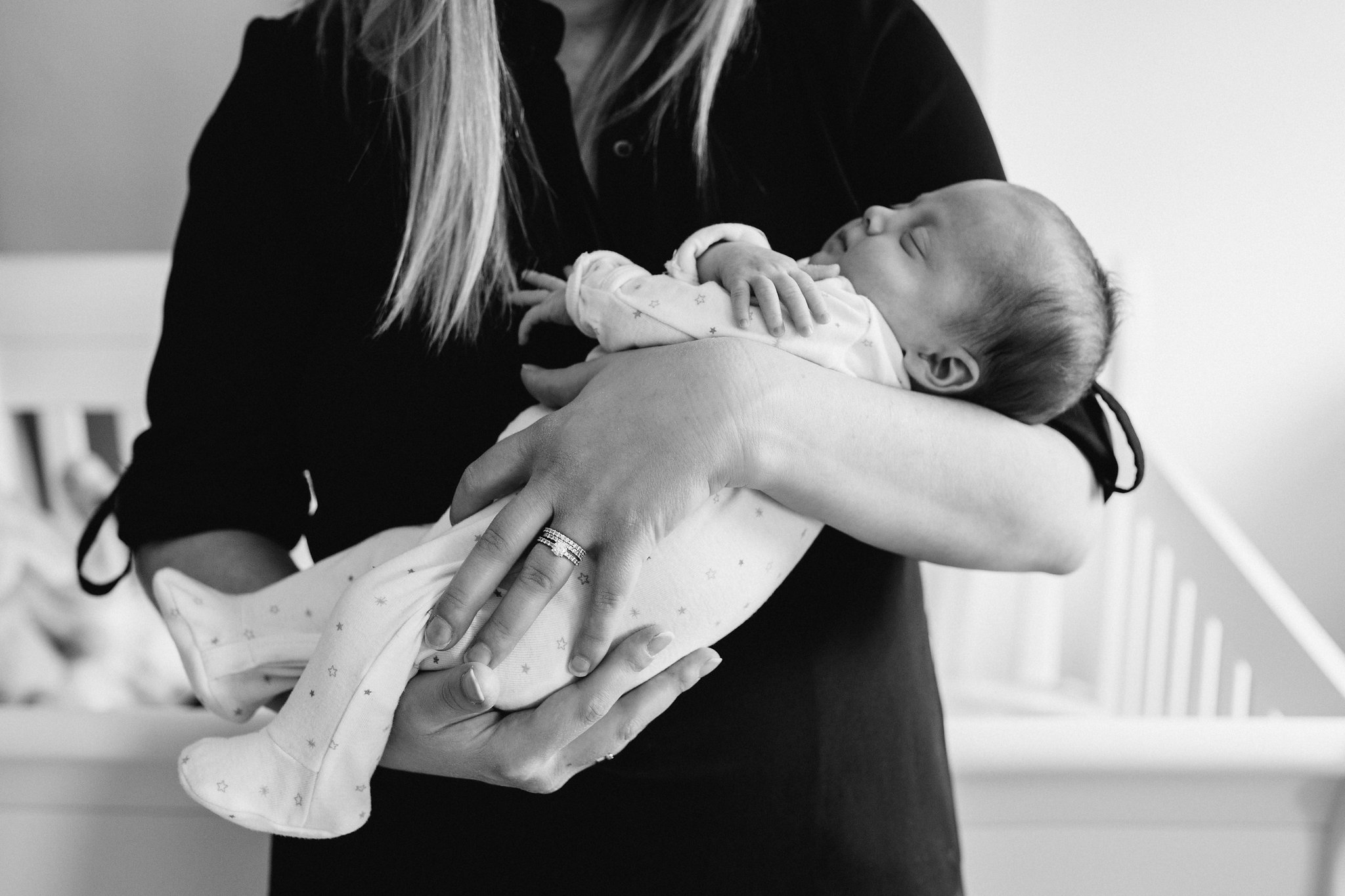 new mom holds 4 week old baby daughter, close up of baby - Markham Lifestyle Photos