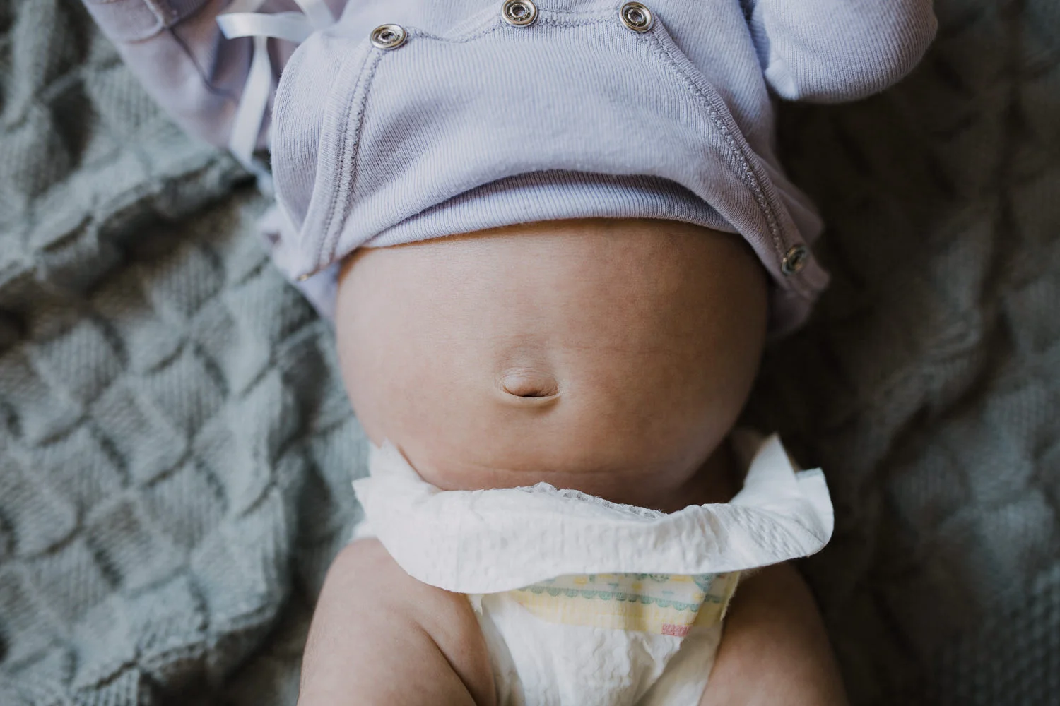close up of 2 week old baby girl's bellybutton - Newmarket In-Home Photography