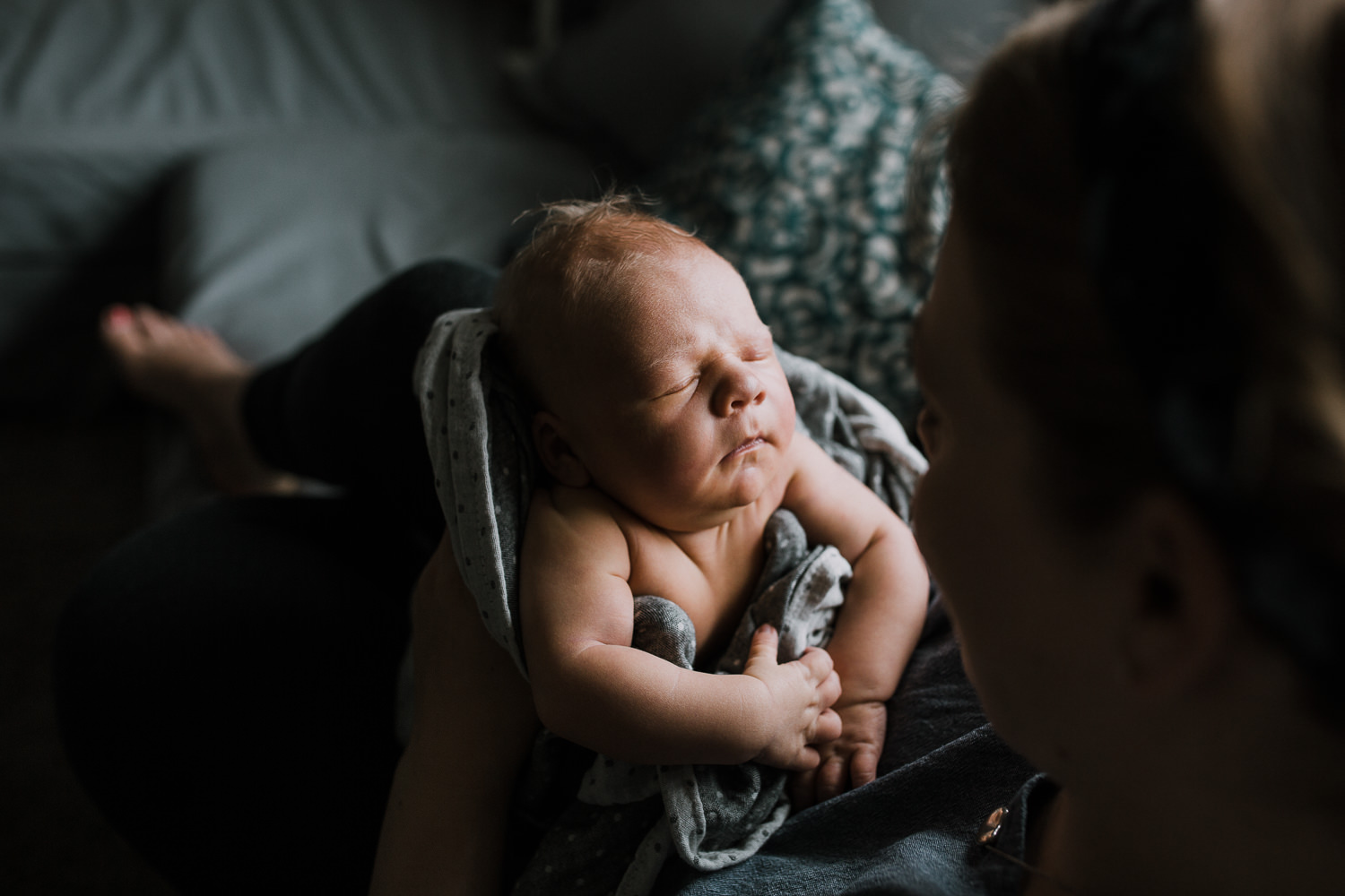 10 day old baby boy fast asleep in mother's arms - Newmarket Lifestyle Family Photos