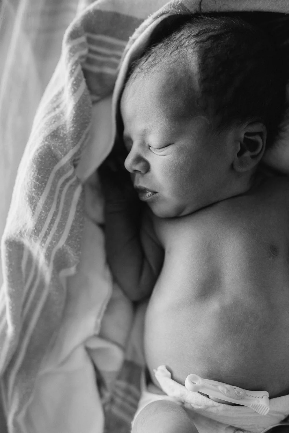 10 hour old baby boy in diaper sleeping in hospital bassinet - Markham Fresh 48 Photography