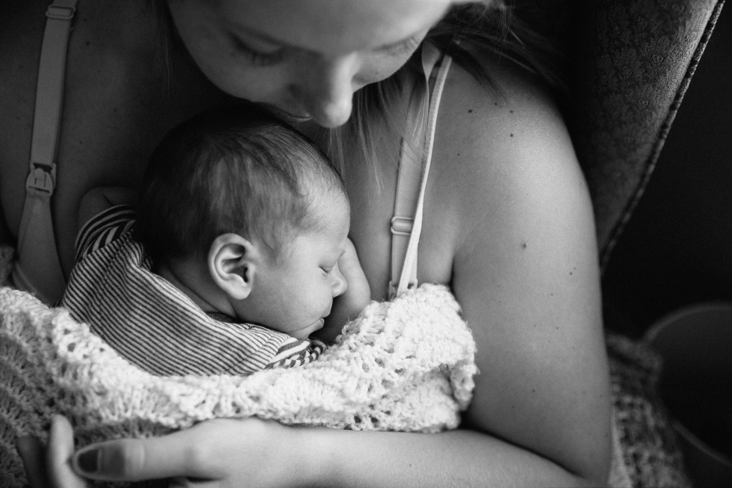 2 week old baby boy sleeping on mother's chest - Newmarket In-Home Photography