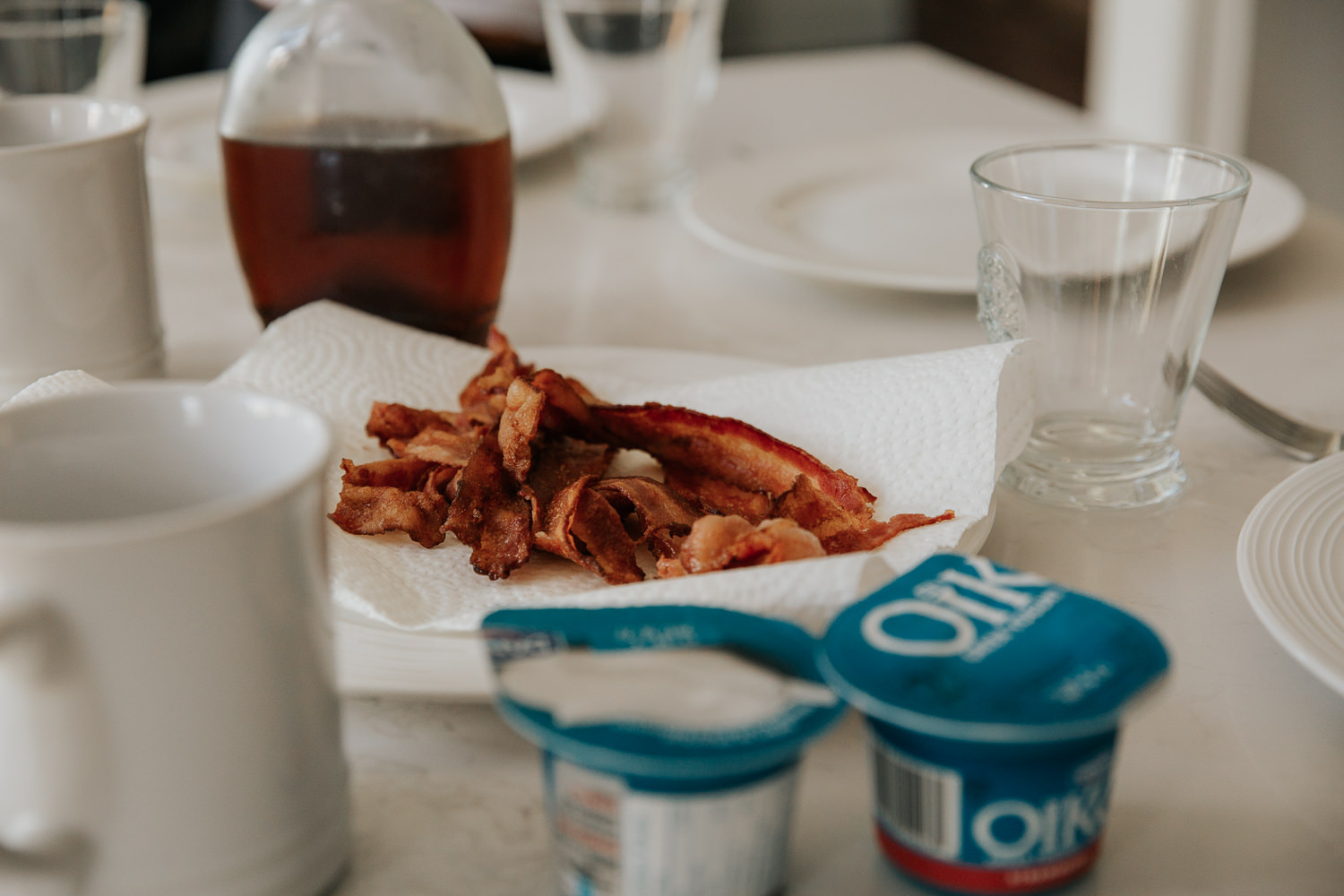 close up of cooked bacon on plate for brunch - GTA In-Home Photos