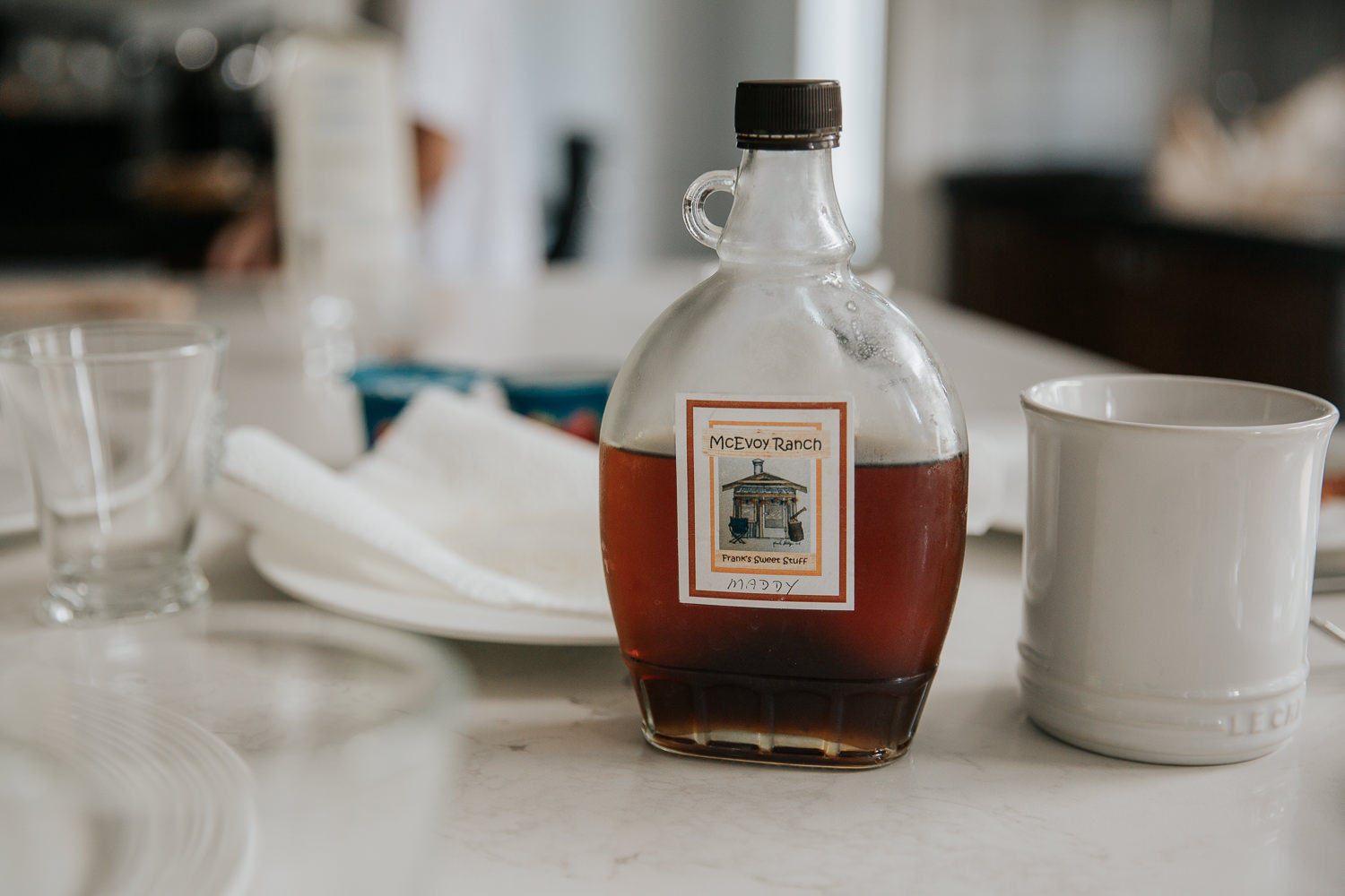 maple syrup on kitchen island set for family brunch - Markham Lifestyle Photos