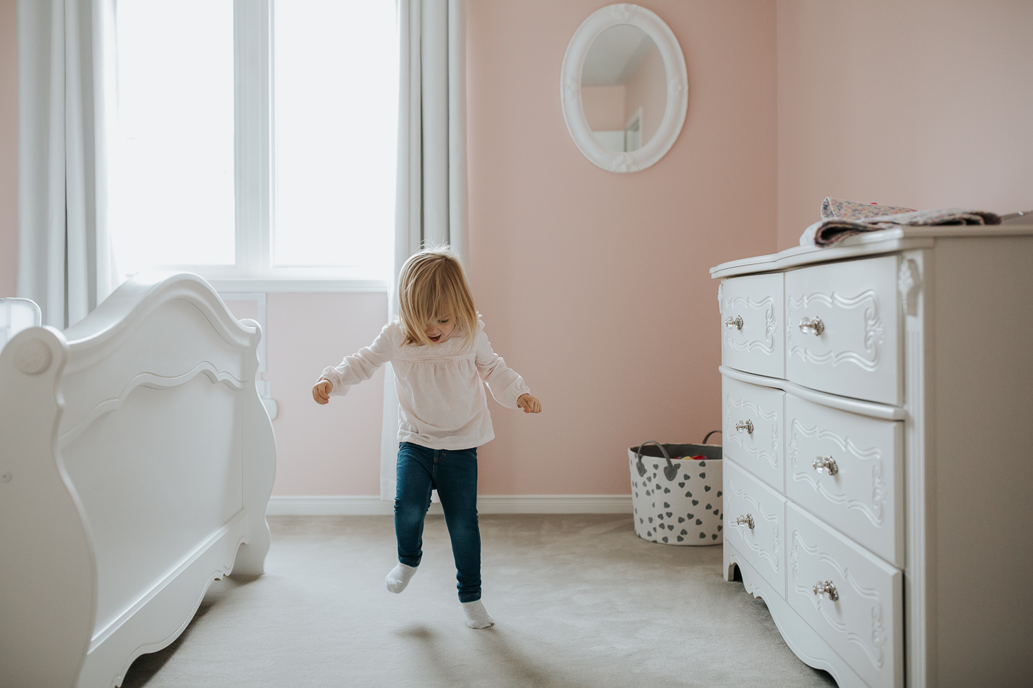 Blonde 2 year old toddler girl dancing in her pink bedroom - Newmarket In-Home Photos 