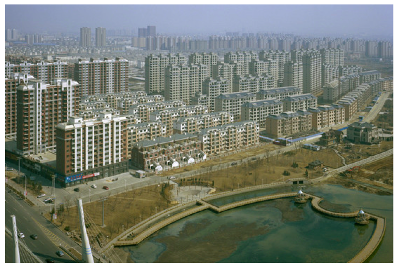 “Ghost city” of unsold apartments in Yingkou, China (Wall Street Journal, 14 Apr 2014)