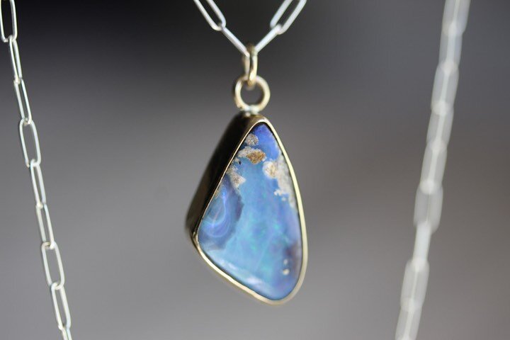 A mixed-metal opal stunner for Lindsay's growing Fancy Boheme collection ⭐
⠀⠀⠀⠀⠀⠀⠀⠀⠀
This Australian boulder opal has its own little world going on in there! This pendant is Lindsay's fourth custom collaboration with me&mdash; she chose this incredib