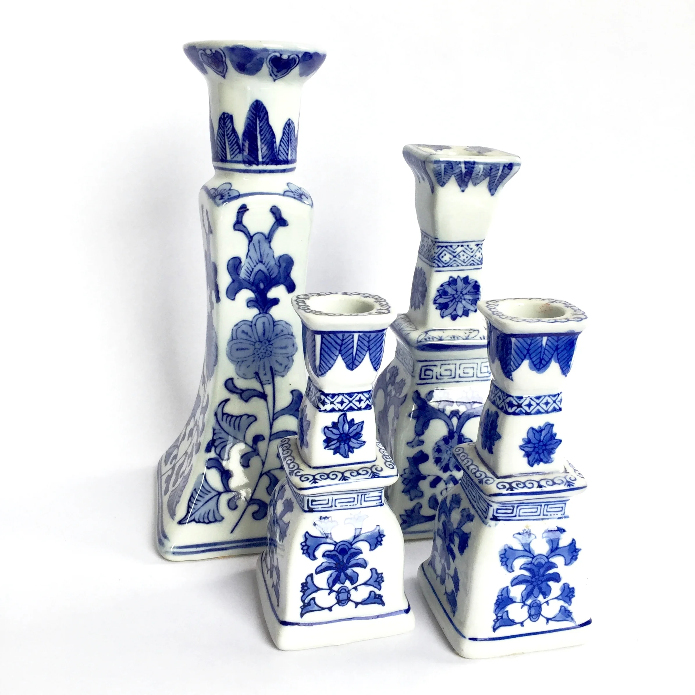 Set of 4 b and w Chinoiserie candle sticks.jpeg