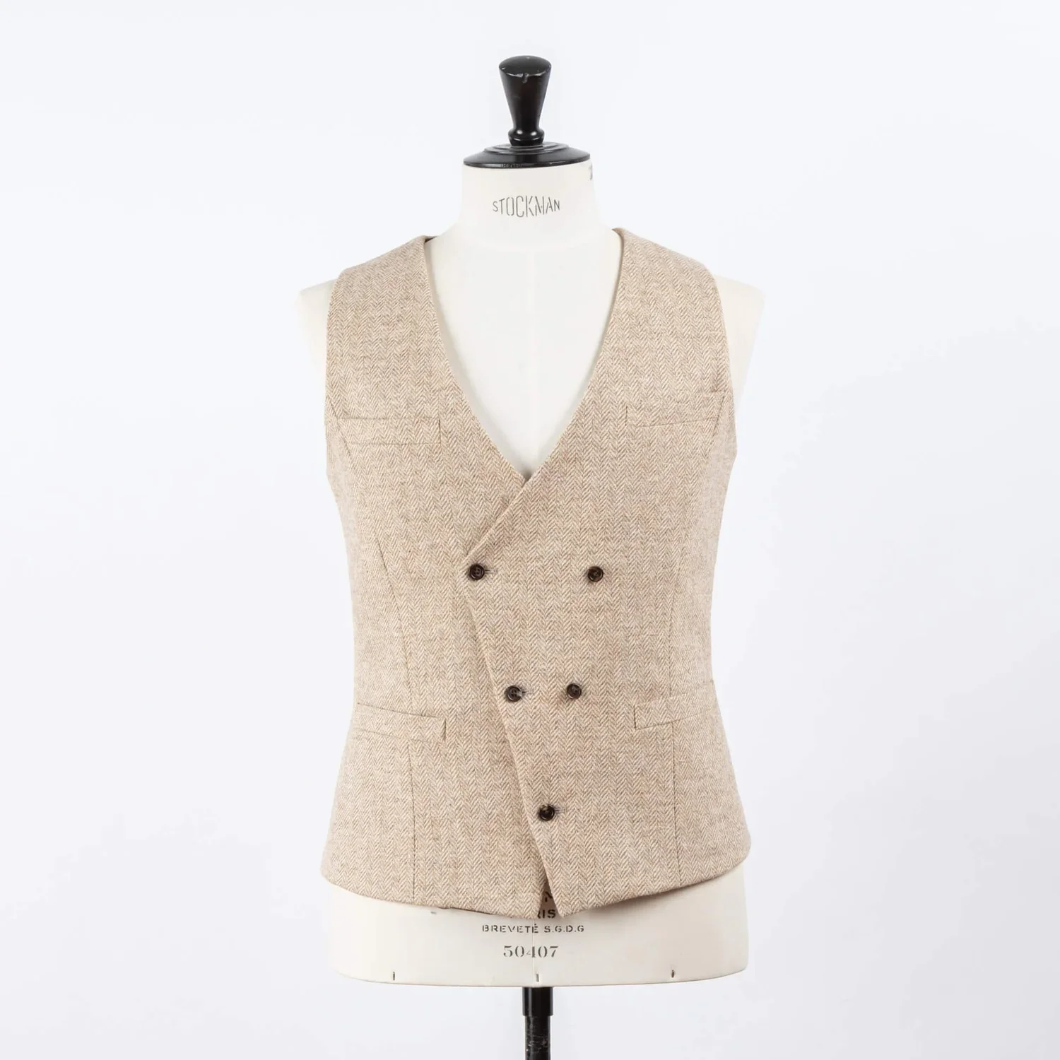 Asymmetrisch heren gilet in beige visgraat vintage stof – bestuursvest op maat