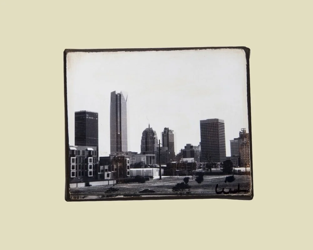 a photo of the oklahoma city skyline mounted on canvas