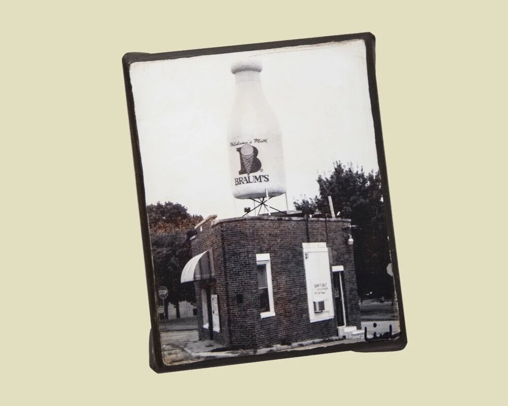 a photo of the Braum's milk bottle attraction mounted on canvas