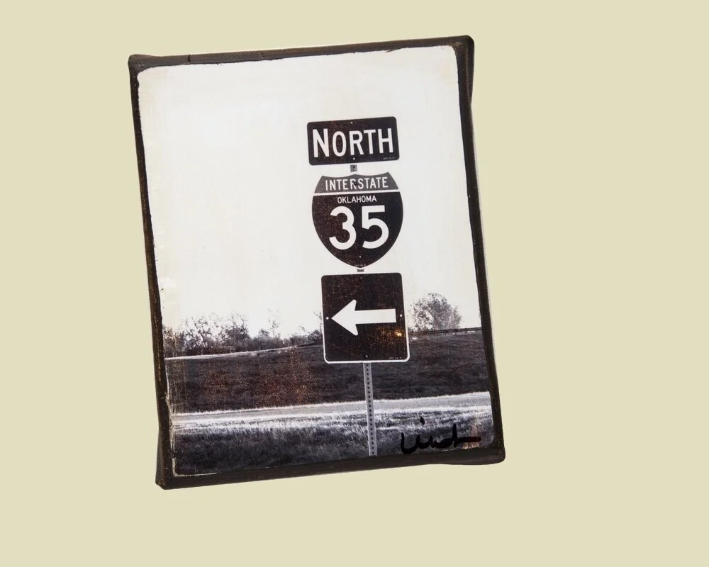 a photo of a I35 north sign mounted on canvas