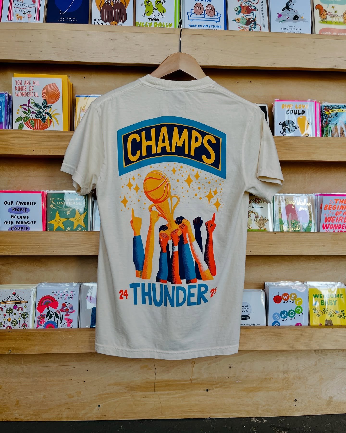 We&rsquo;ve got the champion tees 🏆✨ We&rsquo;ll be open normal hours 11-6pm so come by after the parade for some good times in the @plazadistrict 🤠