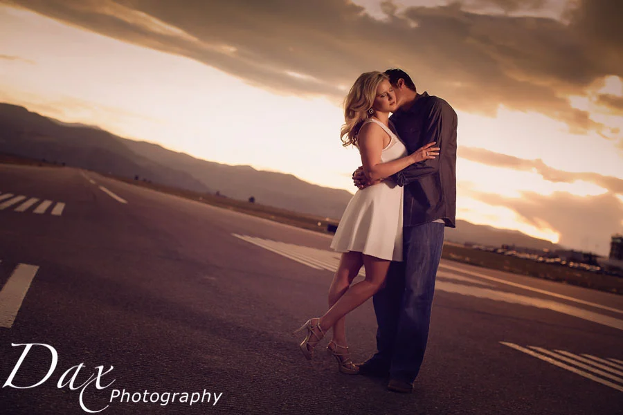 Love is in the air-engagement portrait on airport runway (Ryan and Amanda)