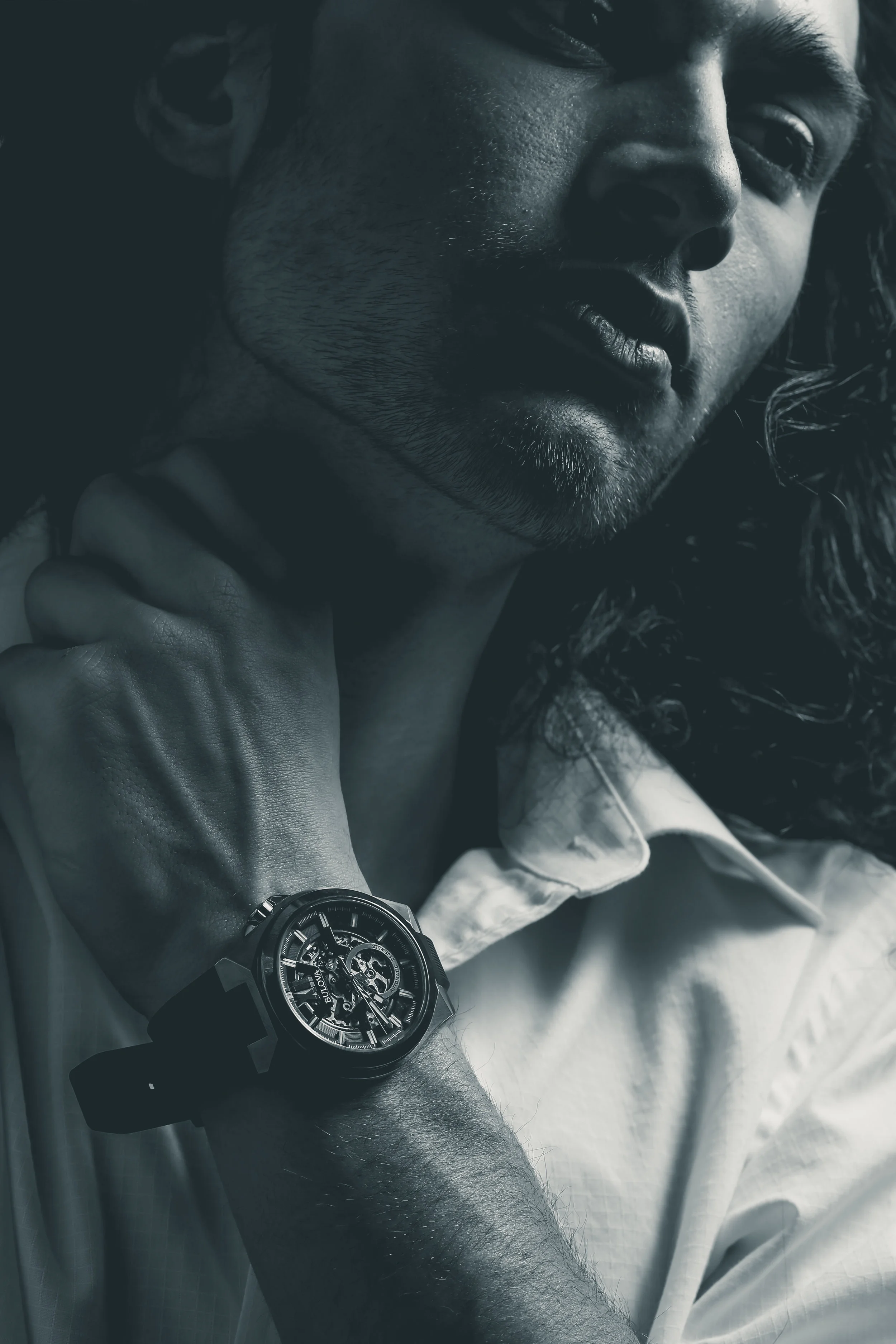 Fashion model in editorial photograph in studio modeling Bulova watch