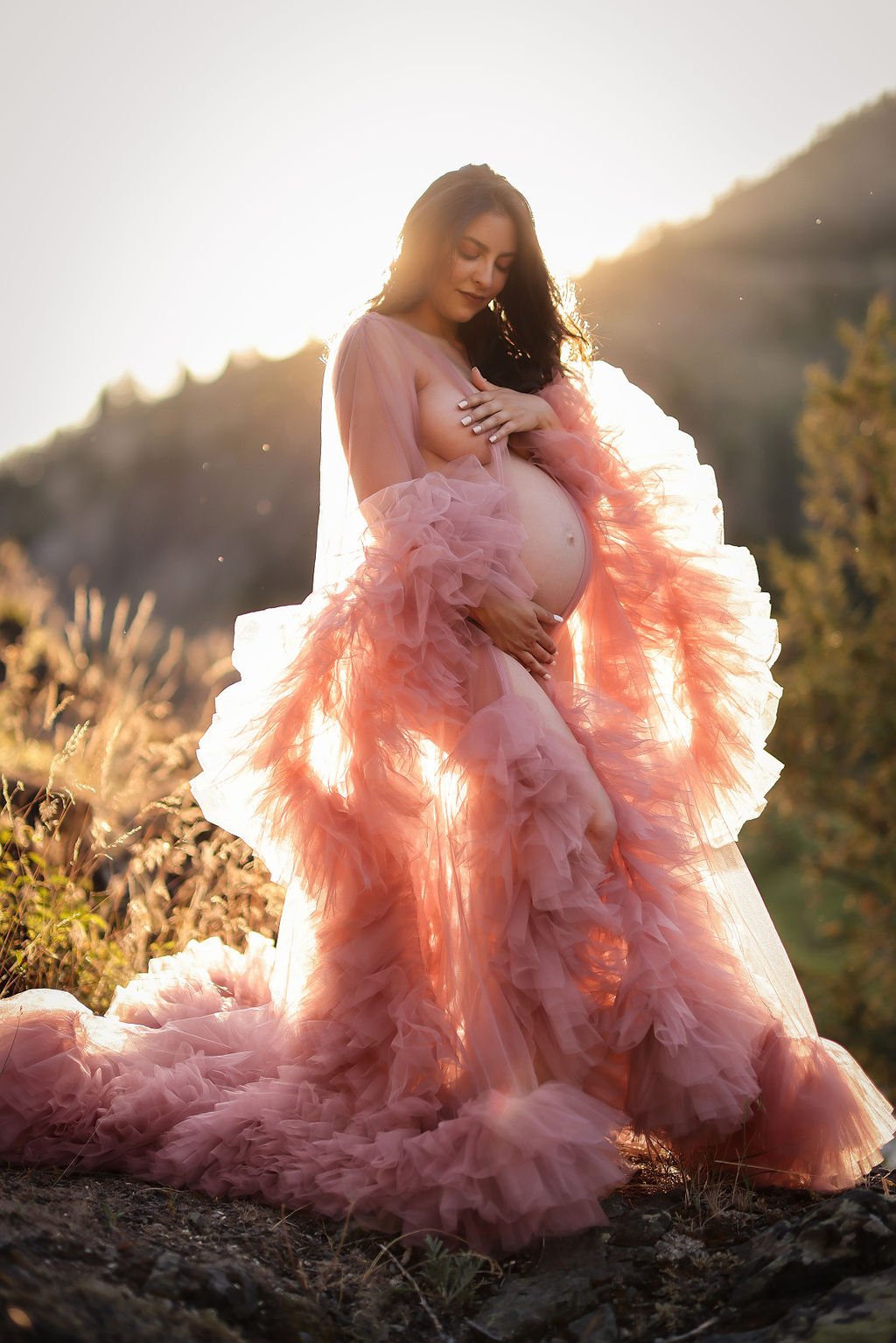 Creative maternity portrait in fluffy maternity gown.jpg