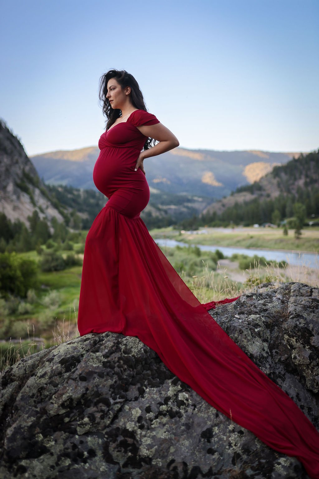 Red maternity gown on top of Montana mountain.jpg