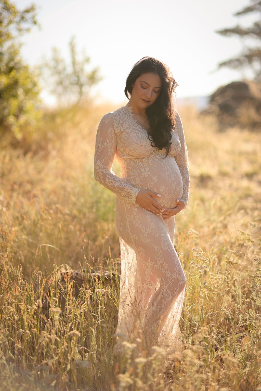 Pregnant belly in white lace gown.jpg