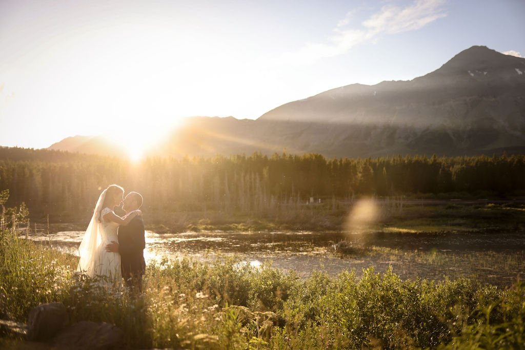 Glacier park wedding couple at sunset.jpg