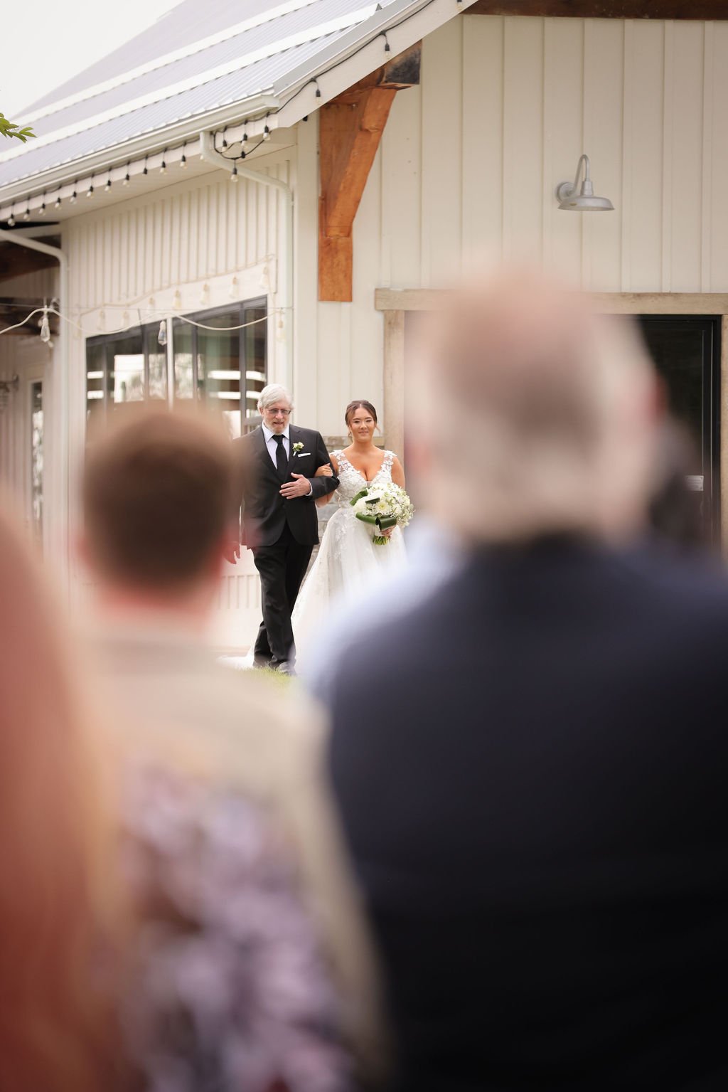 Bride walking down aisle with father.jpg