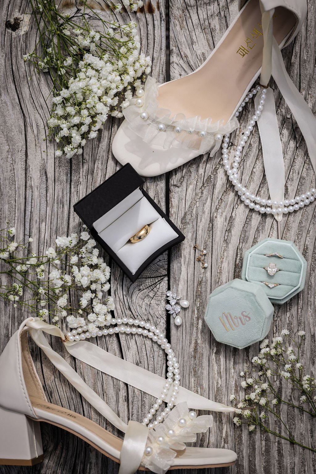 Wedding details of rings and Badgley Mischka heels.jpg