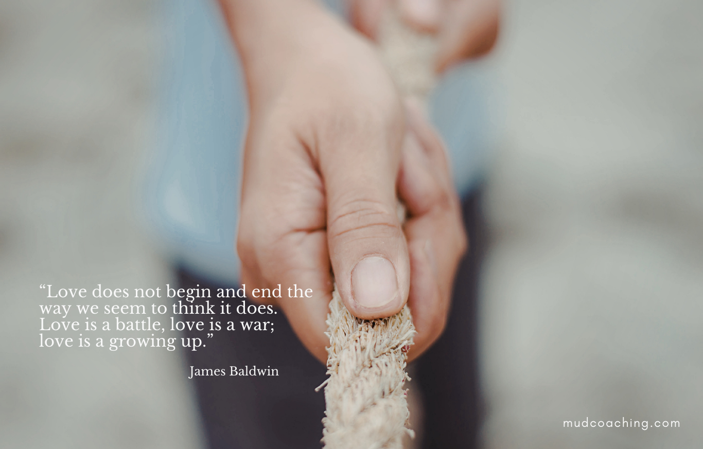 Hands releasing a rope into open space, symbolizing letting go of control, choosing self-respect, and alignment in relationships.