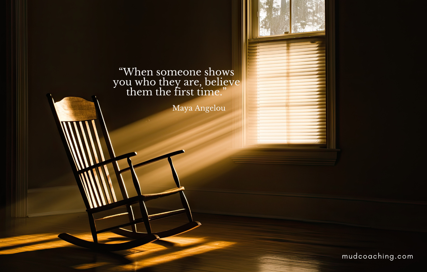 An empty chair by a window representing emotional absence, unmet needs, and waiting for a partner to show up.