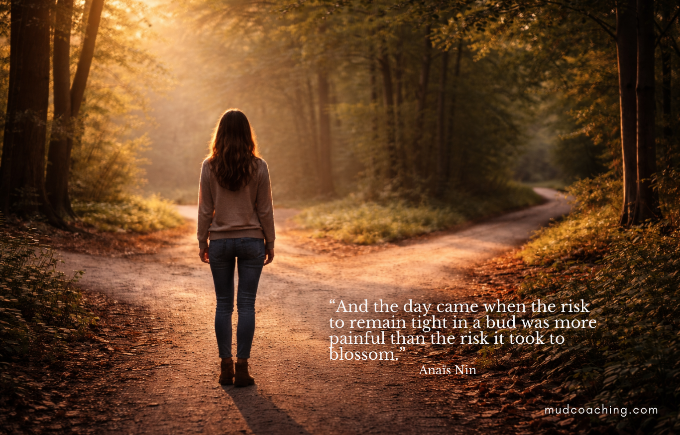 A woman standing at a crossroads in a forest, symbolizing waiting for someone to change and choosing alignment in relationships.
