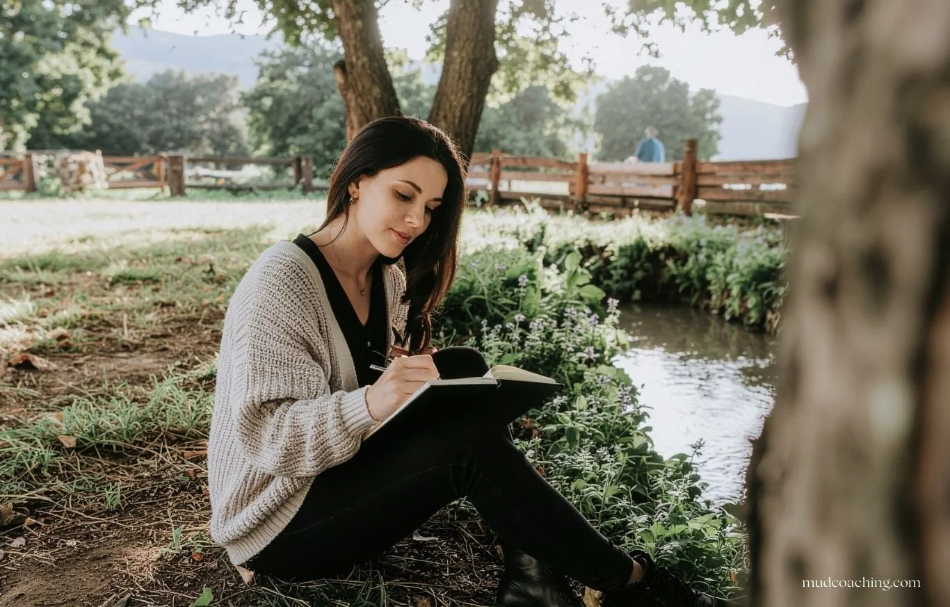 Woman confidently sitting alone reflecting on independence and self-worth