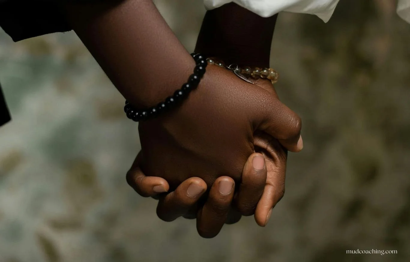 Two hands meeting as equals representing mutual partnership