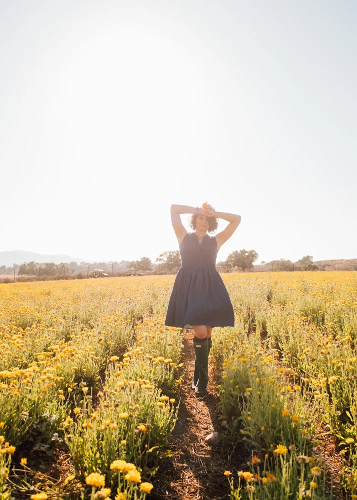 Jessica Iclisoy amongst her calendula plants on the California Baby farm.