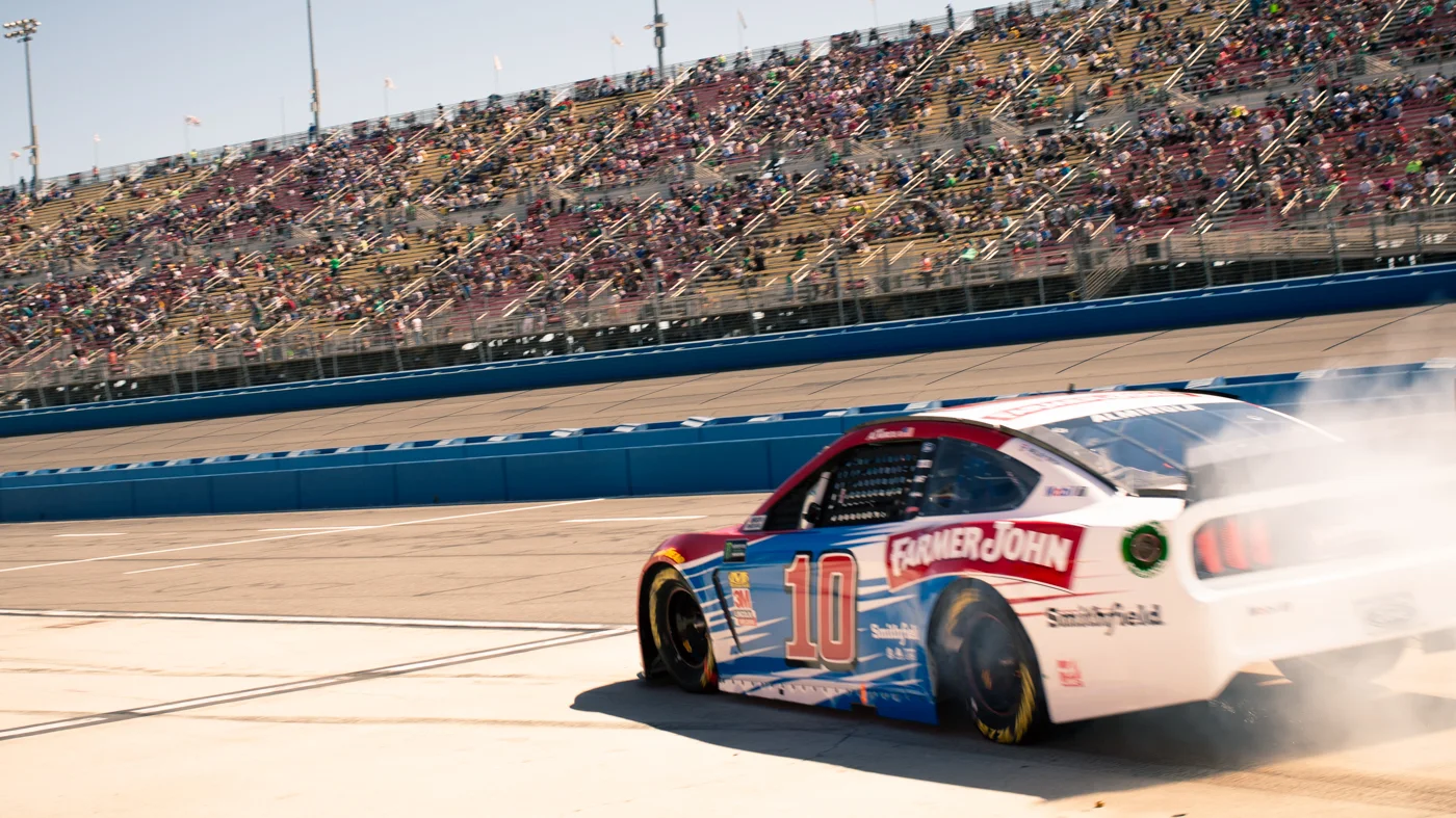 Aric Almirola taking off after a pit stop at Auto Club Speedway in 2019.