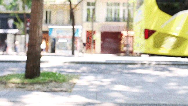 waiting for le bus. (paris, france.)