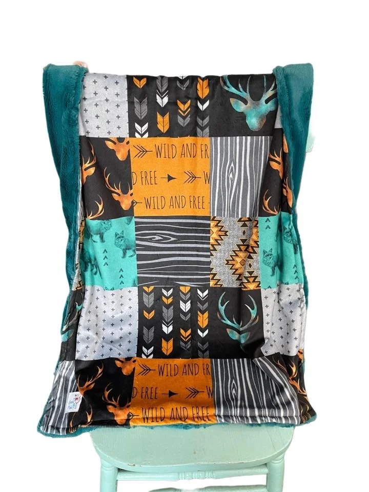 Infant teal and mustard deer patchwork blanket